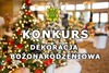 Grafika ze światełkami świątecznymi, herbem gminy wiśniew i napisem KONKURS DEKORACJA BOŻONARODZENIOWA