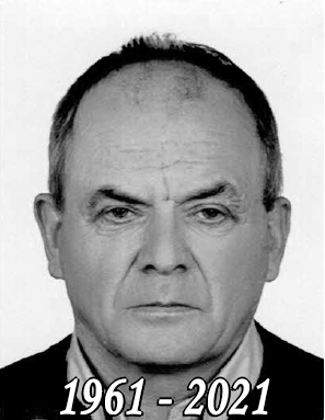 Czarno białe zdjęcie mężczyzny w średnim wieku z napisem 1961-2021